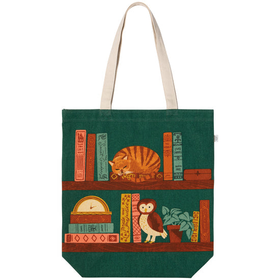 A green cotton tote bag featuring a printed design with books, a cat, and an owl.