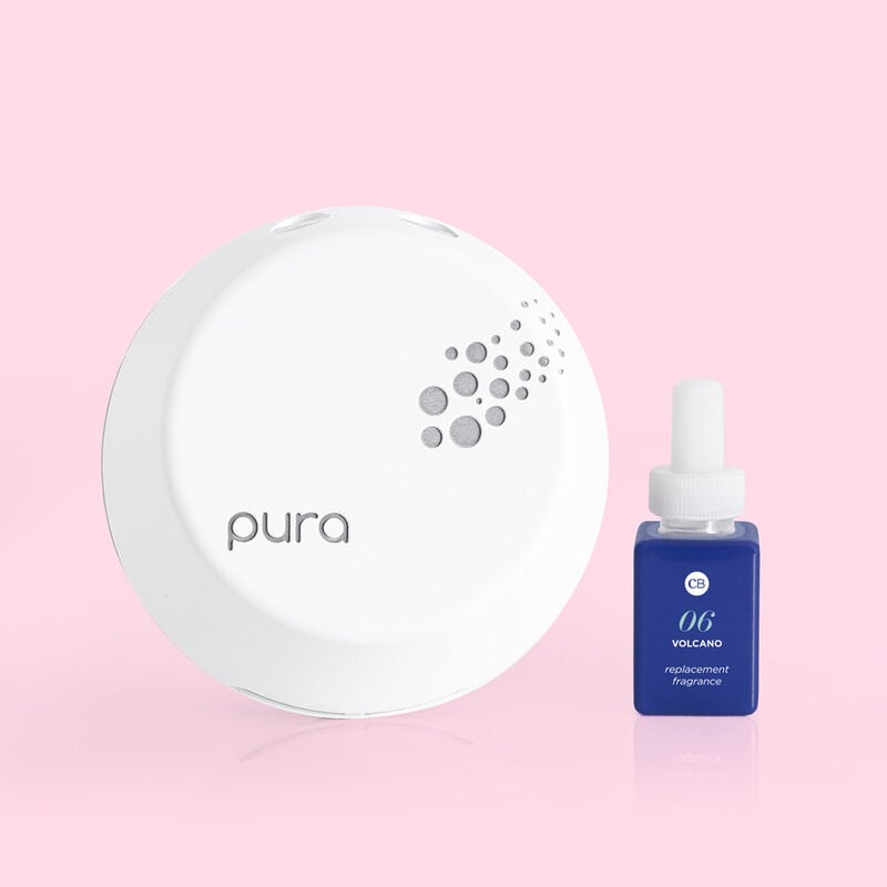 Volcano Pura Replacement Fragrance vial set next to a pure device.