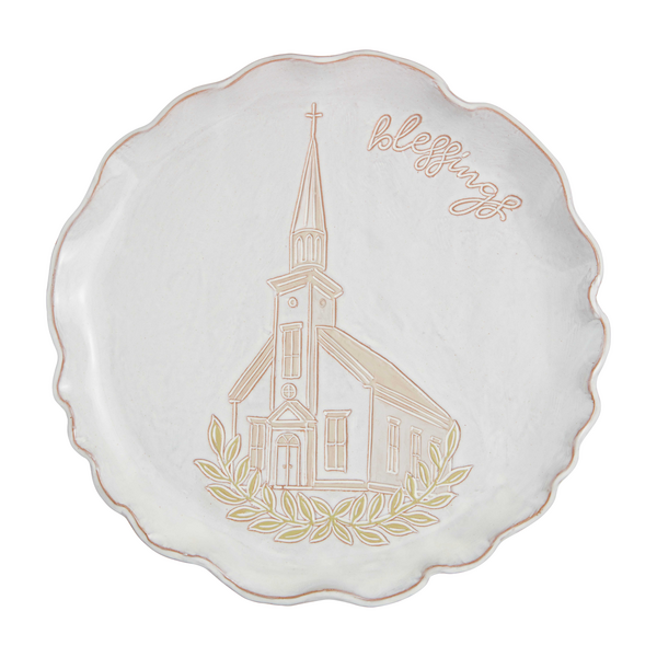 off-white platter with ruffled edge and the image of a church in the center and "blessings" in script along the rim.