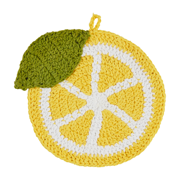 yellow lemon with green leaf shaped crocheted trivet on a white background.