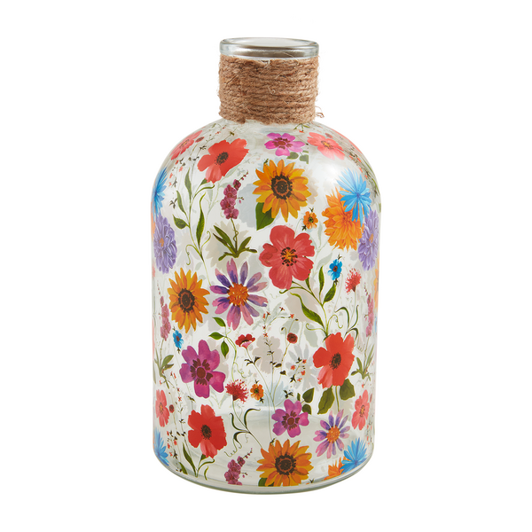 large glass vase with an all-over pattern of colorful flowers and a jute wrapped neck.