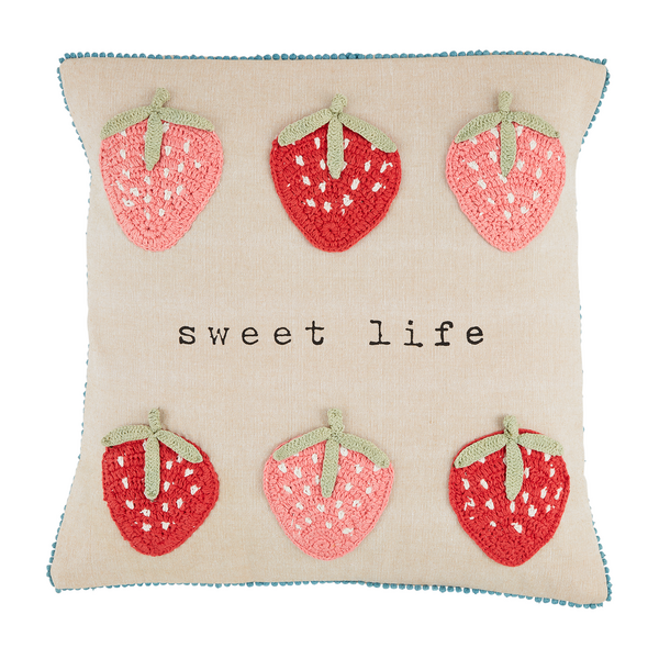 front view of strawberry pillow with "life is sweet" printed in the center.