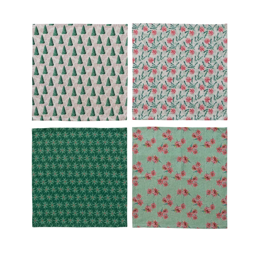 4 assorted Botanical Print Napkins laying flat on a white background