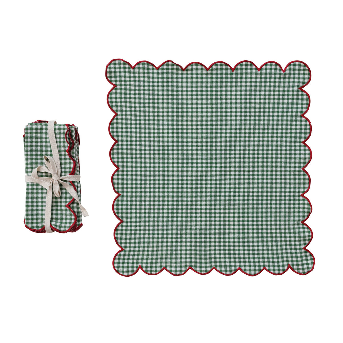 green gingham napkin set next to an unfolded napkin