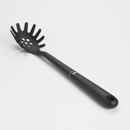 side view of black nylon spaghetti spoon.