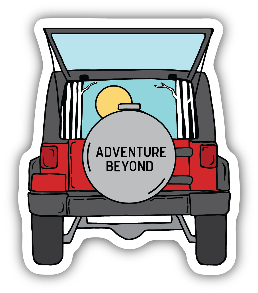 red jeep with "adventure beyond" on the tire cover