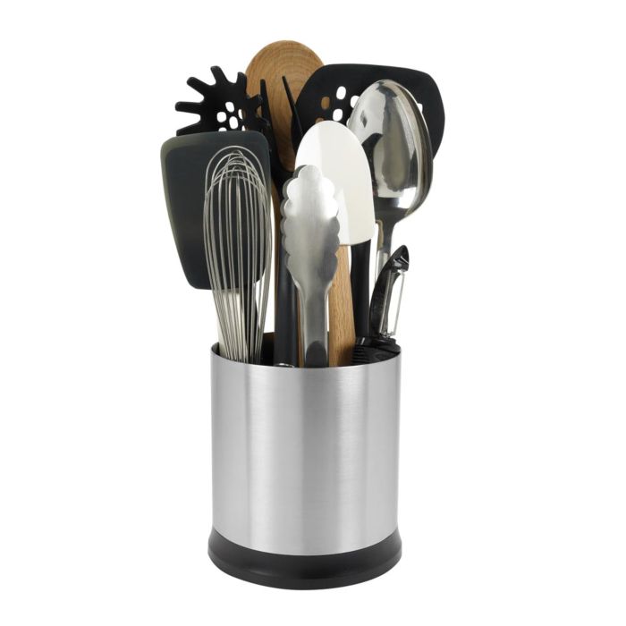 crock filled with assorted utensils.