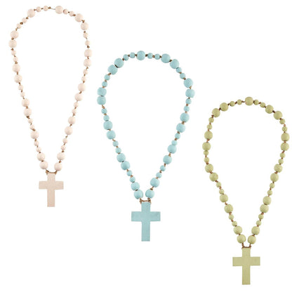 all three colors of decorative cross beads displayed on a white background