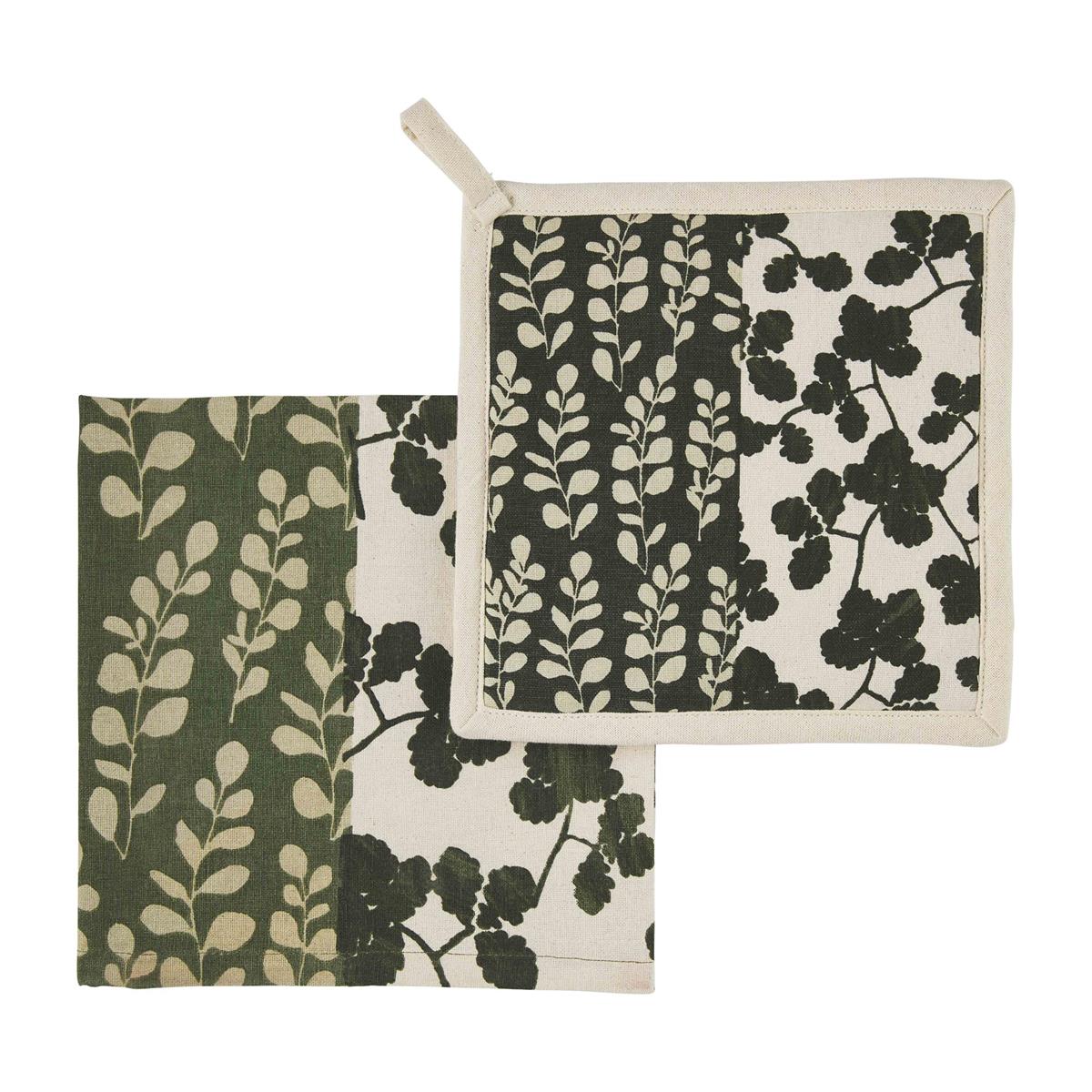 green and cream dishtowel and potholer with leaf design.