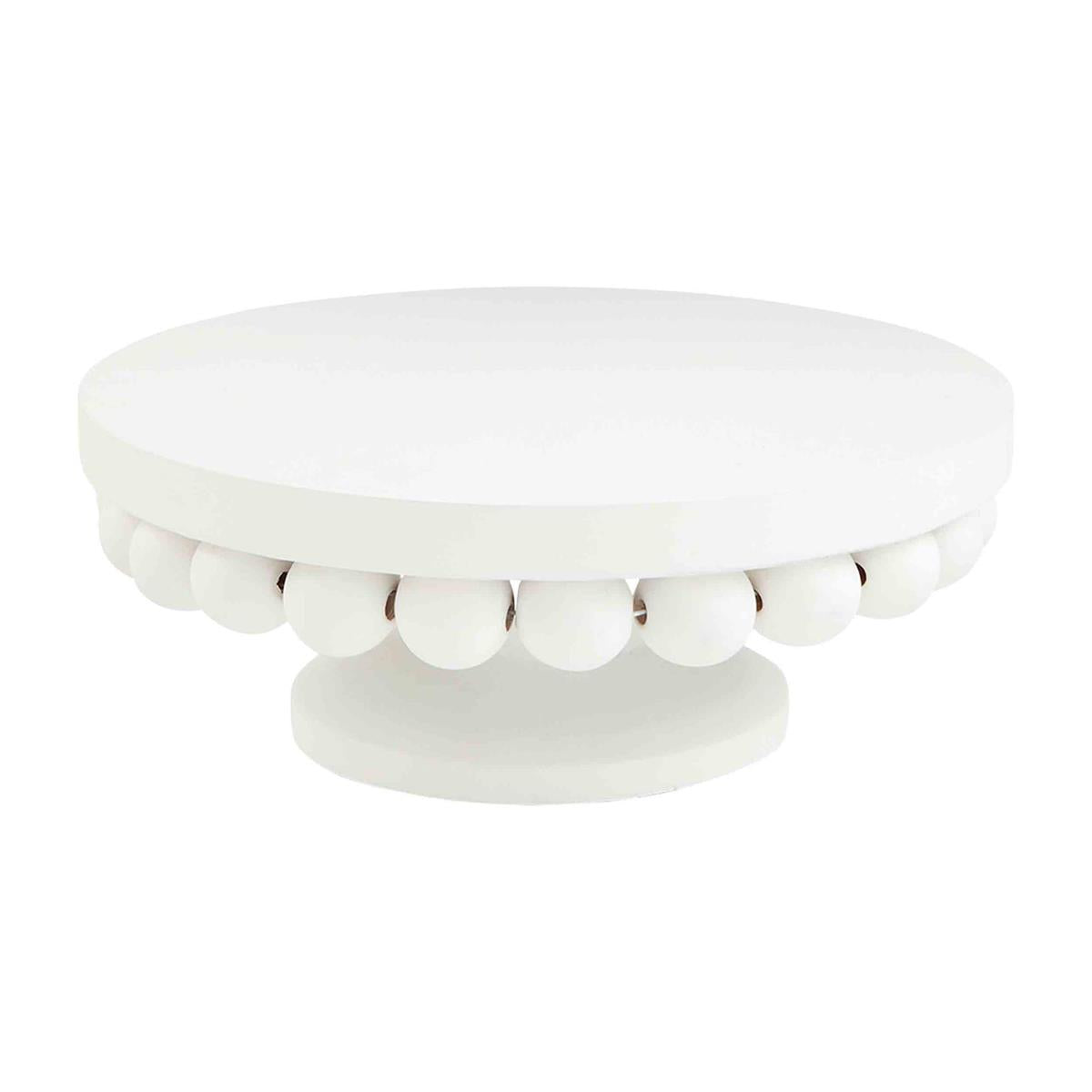 small beaded pedestal on a white background