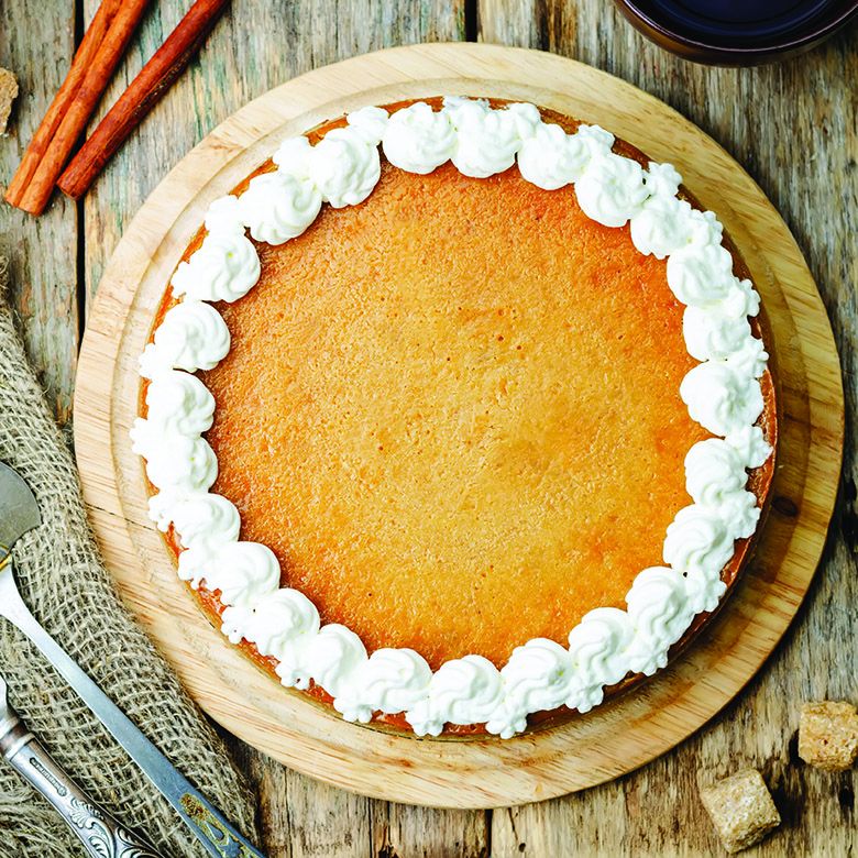 pie with whipped cream around the rim.