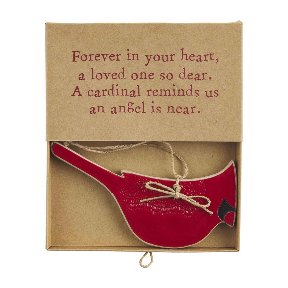 red cardinal ornament in kraft gift box.
