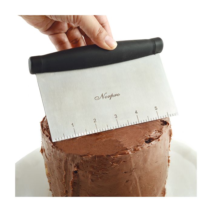 chopper spreading icing on cake.