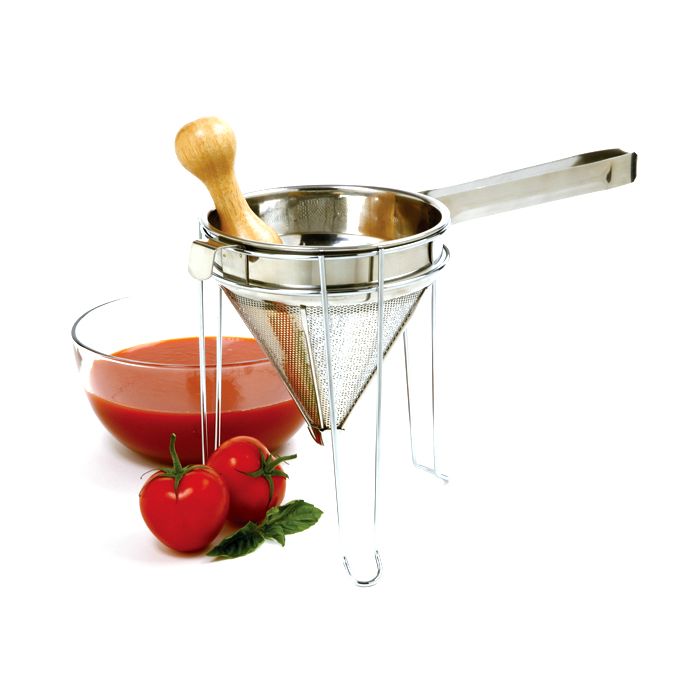 Chinois with tomatoes and tomato puree next to it.