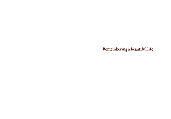 inside of card is white with text on the right side "remembering a beautify life"