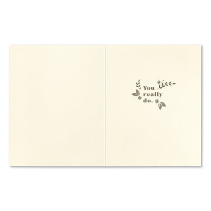 inside card is cream with gray inside text and floral design