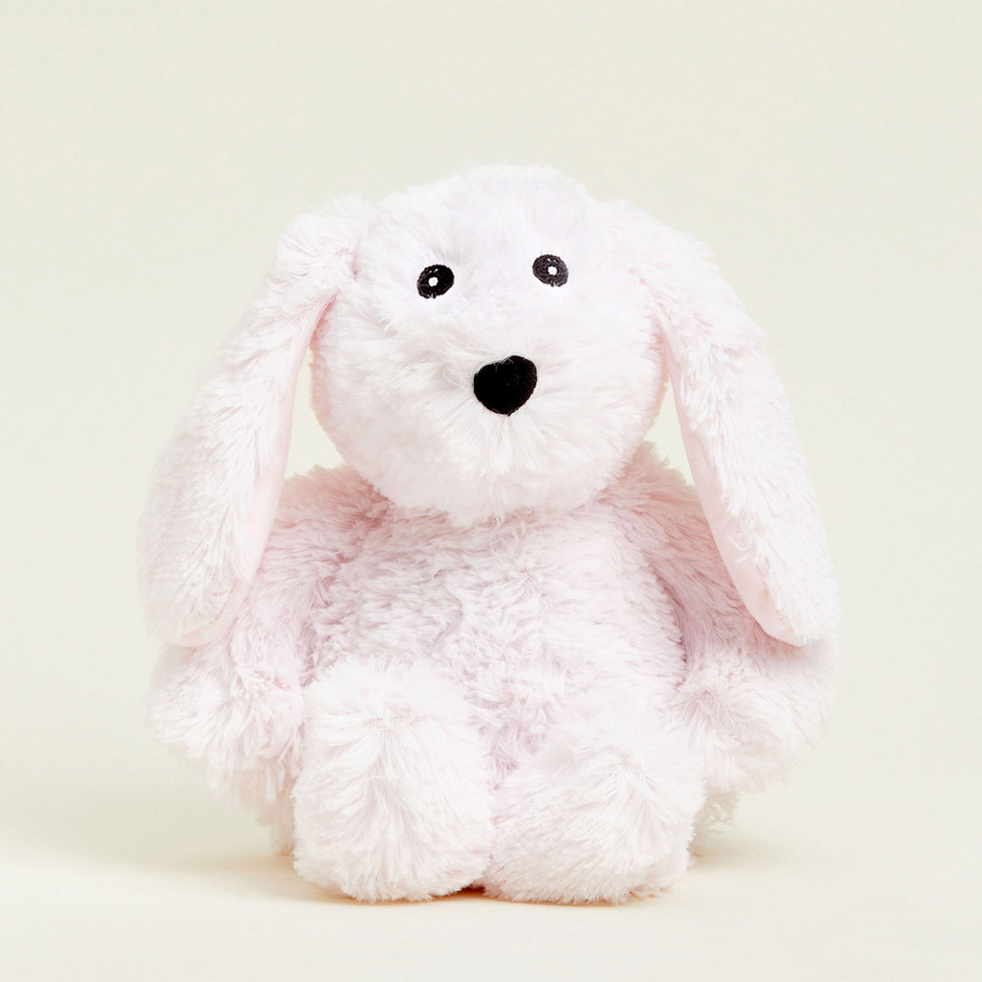 Bunny Plush Toy on cream background.