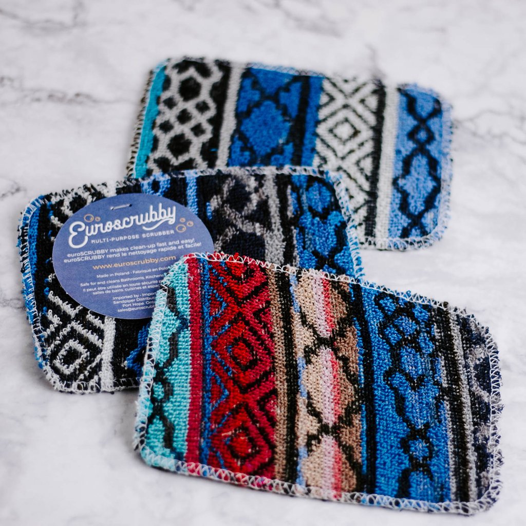 three assorted patterns of the original scrubby on a marble background