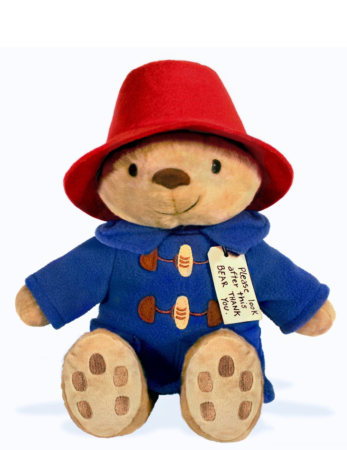 plush paddington bear doll on white background.