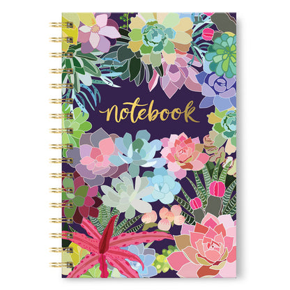 spiral notebook on white background. notebook cover has navy background with graphics of assorted colorful succulents. "notebook" is written in center of notebook.