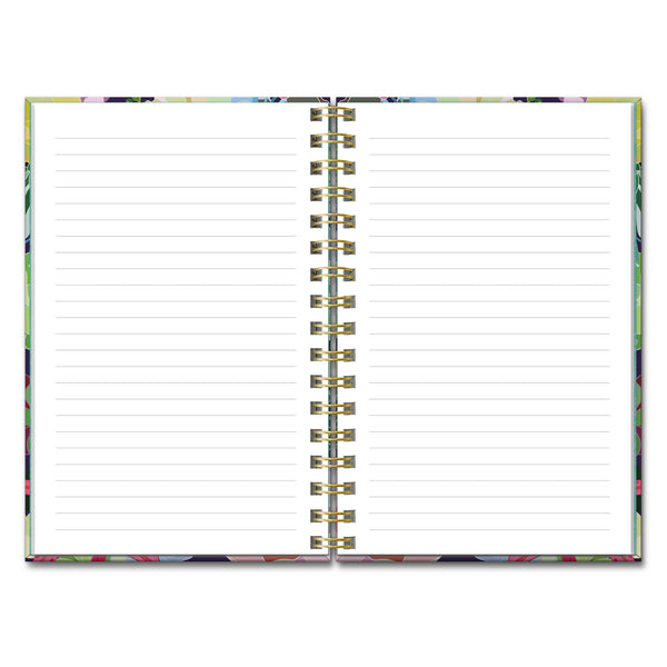 open notebook showing lined pages and golden spiral binding.
