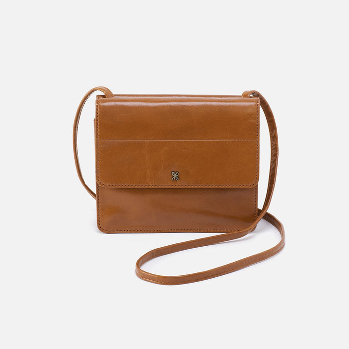 front view of the truffle jill wallet crossbody on a white background