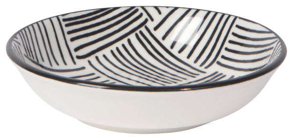 off-white bowl with black lines.