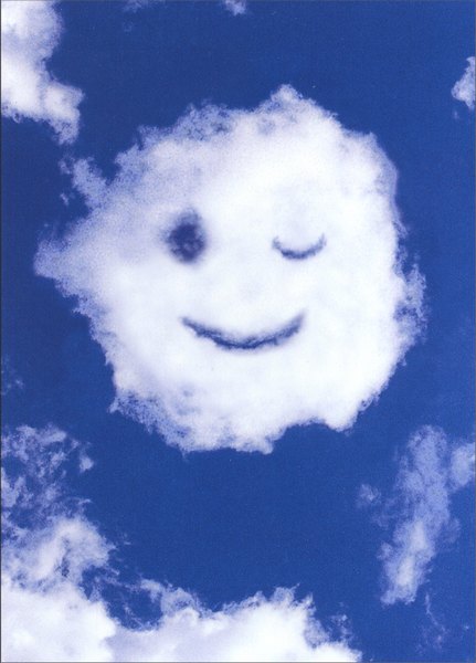 front of card has a blue sky with a winking cloud