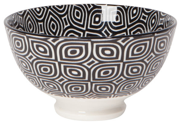 white bowl with black geometric pattern.
