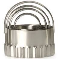 biscuit cutters nested together on white background.