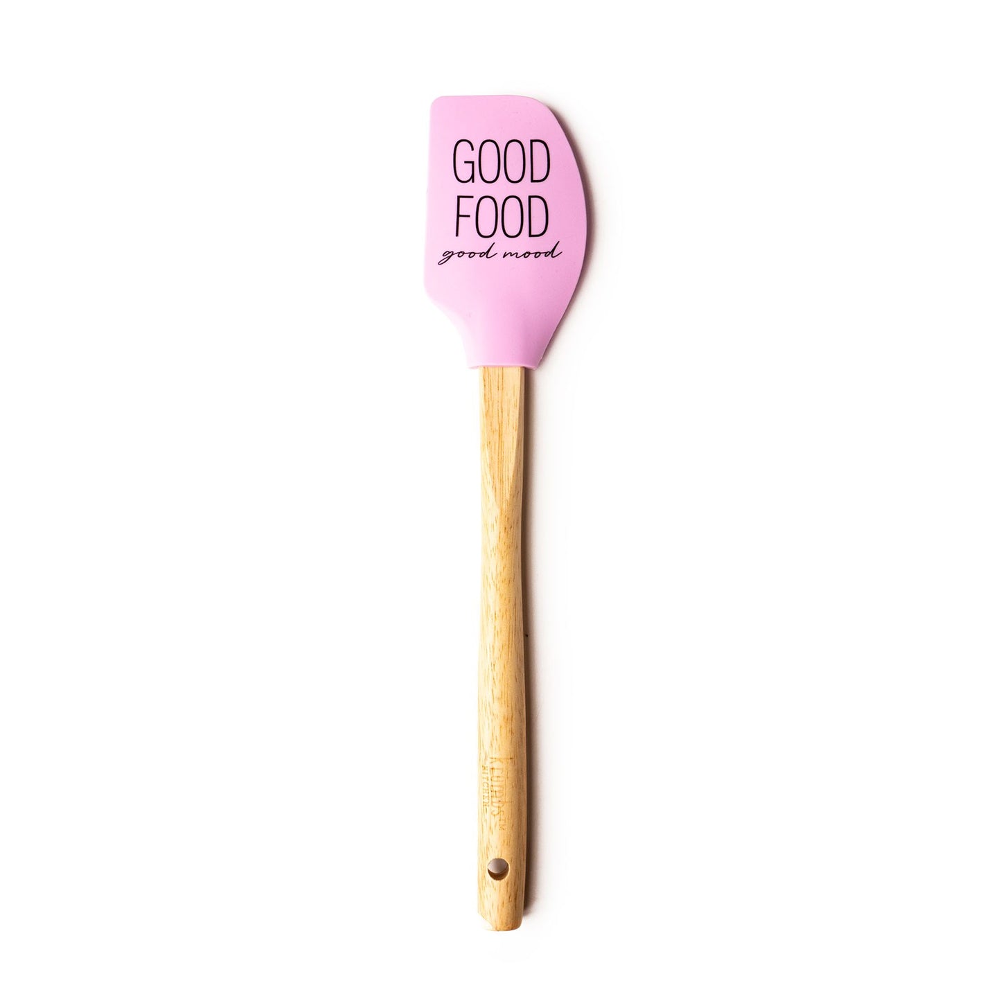 pink spatula with "good food good mood" printed on it and a wooden handle.