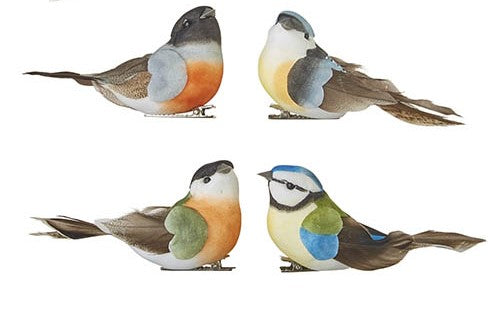all four styles of clip on feathered birds displayed on a white background