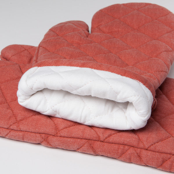 mitt with cuff folded to show interior lining.