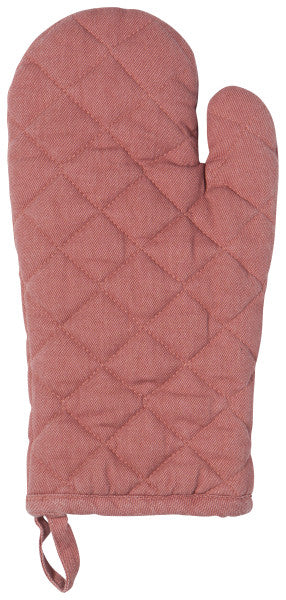 light rose colored oven mitt on white background.