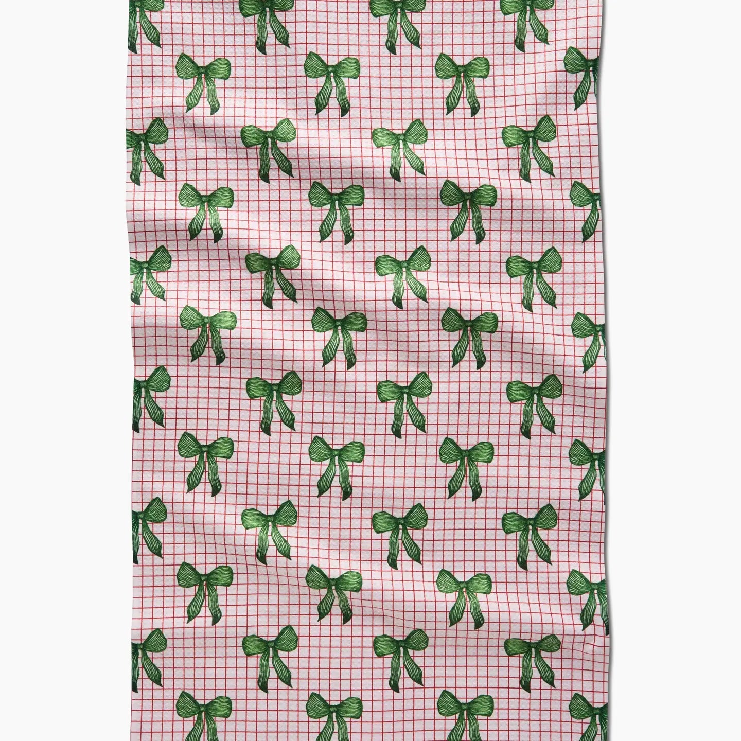 red and white grid pattern with green bows