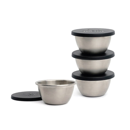 3 small stainless steel bowl stacked and another bowl set next to them