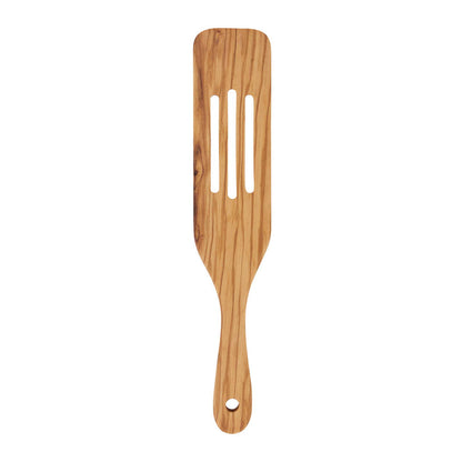 An olive wood slotted spurtle with a smooth finish and a handle.