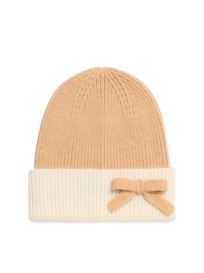 tan beanie with cream cuff with a tan bow