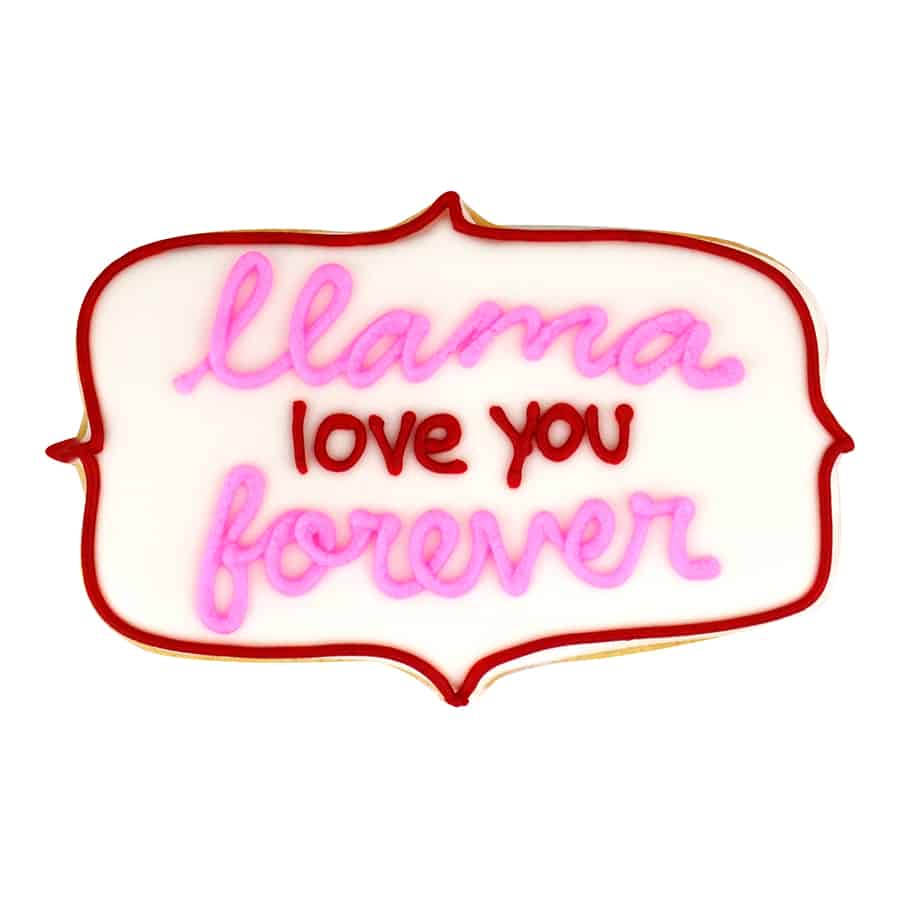 pink, red and white iced cookie with 'Llama love you forever' text on a white background