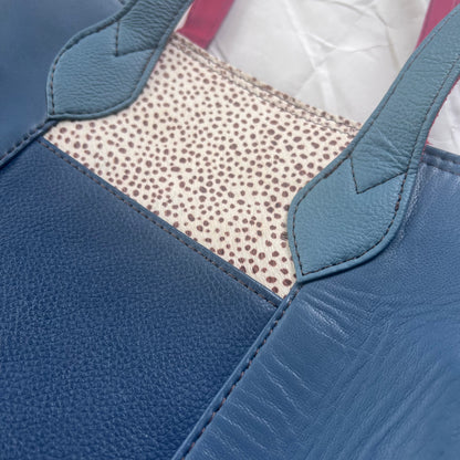 close-up of blue side of giselle tote