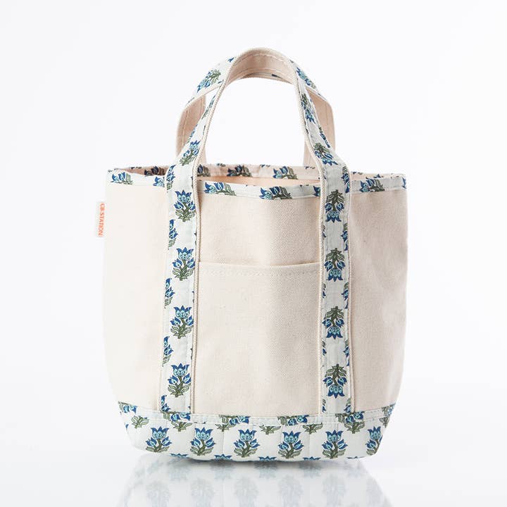 off white tote with aqua floral printed handles and trim