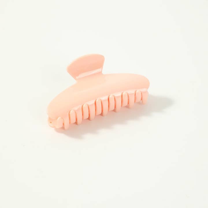 Hair Claw Clip, Light Pink on a white background