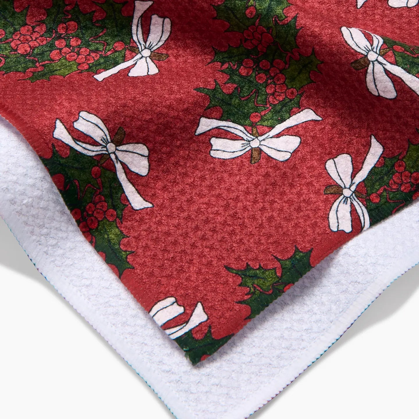 close-up of corners of Christmas Berry Bow Tea Towel