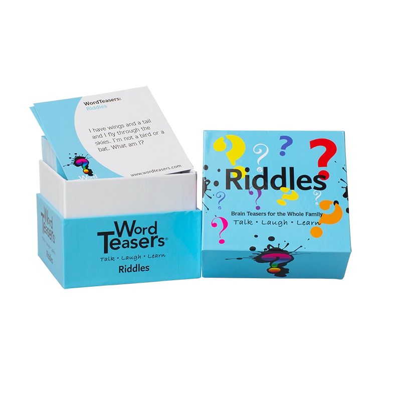 box of word teasers riddles game, open with lid off to the right and a game card sitting on top of open box.