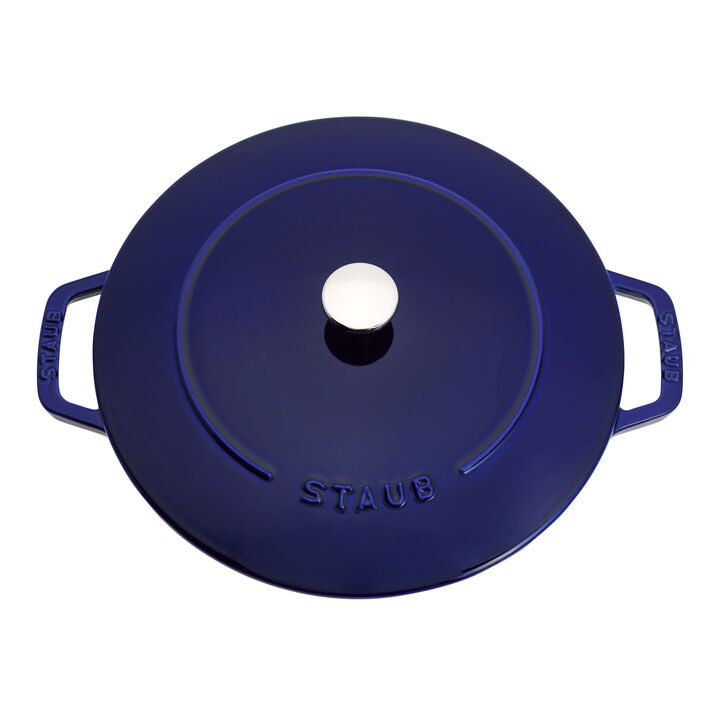 Top view of dark blue French oven with lid on it