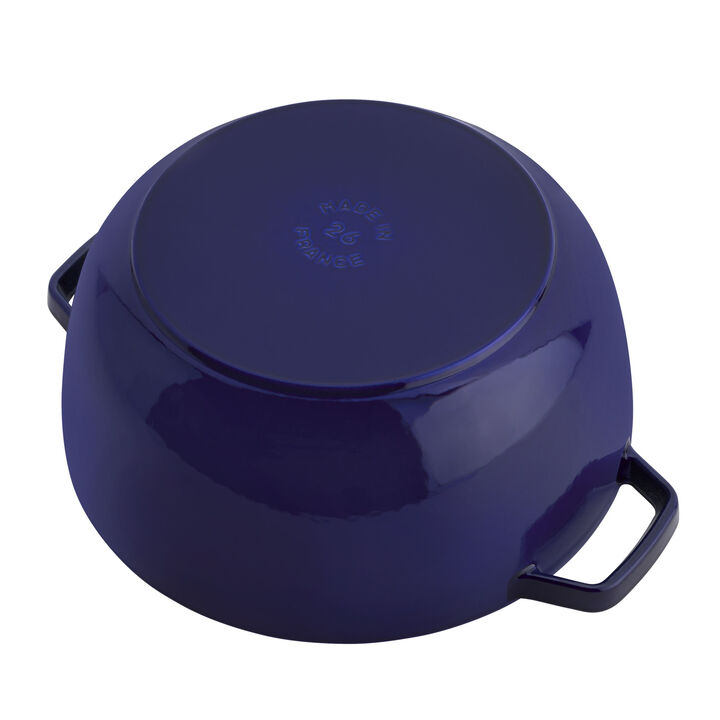Bottom view of dark blue French oven showing the base of the pot