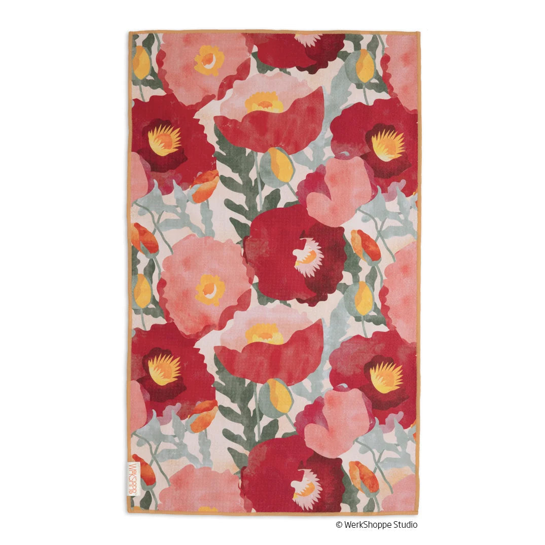 pink and red floral pattern hand towel shown on a white background