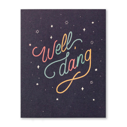 front cover of card is black with multi colored text and stars listed in the title and displayed against a white background