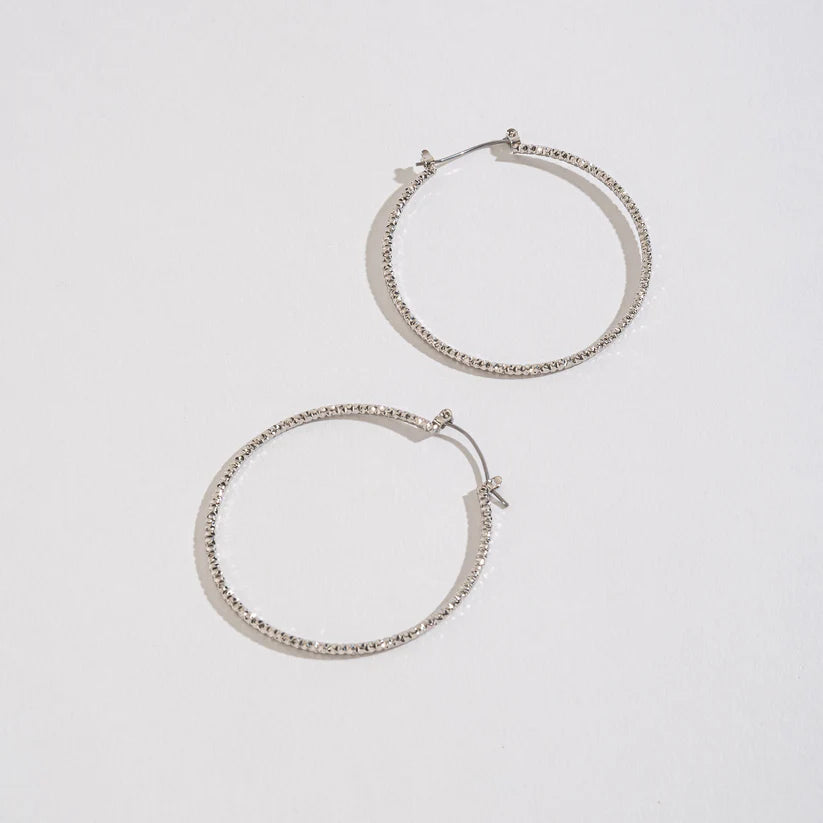 Large Textured Hoop Earrings on a white background.