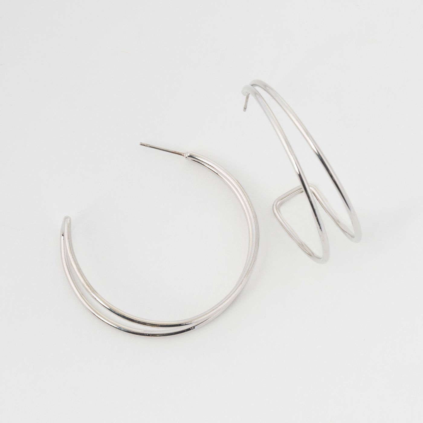 silver double hoops on a white background.